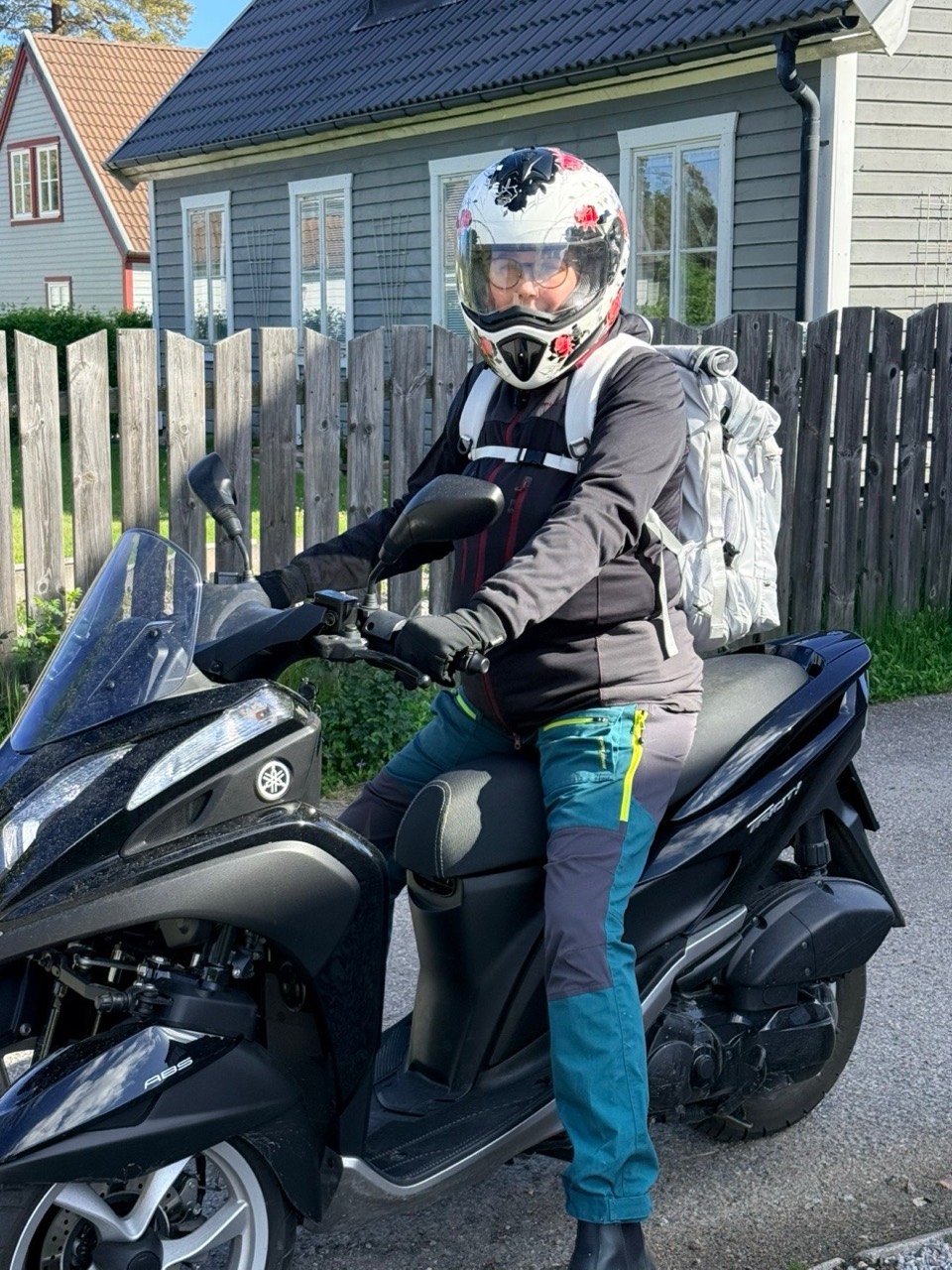 Till Jenny cover artwork: a helmeted person on a scooter outdoors